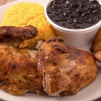 Combo 2: 1/2 Chicken · Two sides included rice, black beans, sweet plantain, salad, or French fries and soda.