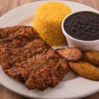 Combo 4: Breaded Steak · Two sides included:  rice, black beans, sweet plantain, salad, or French fries and soda.