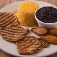 Combo 7: Grilled Pork · 1/2 lb. Two sides included rice, black beans, sweet plantain, salad, or French fries and soda.