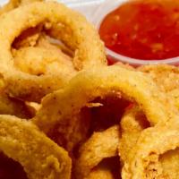 Calamari · Crispy Golden Calamari rings with just the right kick! Serve with Sweet chili sauce on the s...