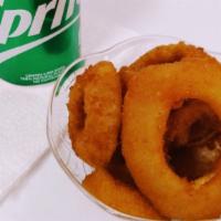 Onion Rings · Crispy fried Onion Rings bursting with flavor after every bite. Served with Golden Vibes dip...