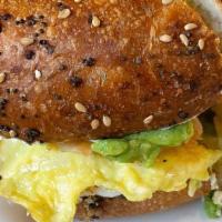 California Avocado Bagel. · Everything bagel with cream cheese, avocado, cucumbers, scrambled eggs, salmon.