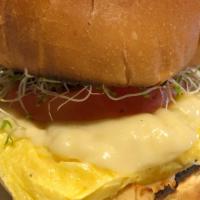 Morning Delight · Tomato, eggs, provolone cheese, hemp seeds, sprouts, garlic aioli on a challah bread