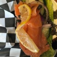 Salmon & Cream Cheeese On Everything Bagel · Everything bagel, cream cheese, red onion, cucumber, lettuce, capers, olive oil, salmon, lem...