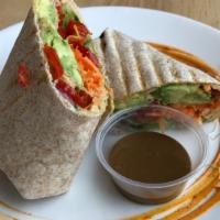 Avocado & Veggie Wrap · Wheat wrap, avocado, hummus, cucumbers, apple, carrot, pumpkin seeds, roasted pepper, olive ...