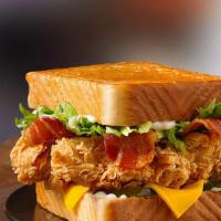Chicken Club Sandwich · Fried chicken, Cheddar cheese, bacon, lettuce, tomato and mayo on buttered Texas toast.