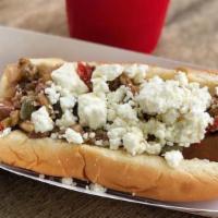 Nicks Famous Greek Dog · 100% Nathan's beef hot dog topped with feta cheese, olive tapenade, and tzatziki sauce.