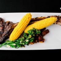 32 Oz Tomahawk Steak  · Hand Cut Certified Angus Beef, Dinner for 2.
Sides Included