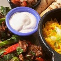 Vegetable & Mushroom Fajitas · Served with a side of Mexican Rice, refried beans, guacamole, pico de gallo, sour cream, 3 w...