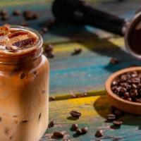 Iced Latte · Made with milk and espresso. The milk on a latte is lightly textured with a thin layer of fo...