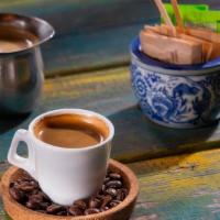 Single Espresso · Colombian certificate fair-trade coffee; saving the rain forest.