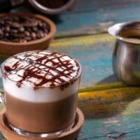 Mocha · Single shot espresso combined with chocolate sauce and steamed milk, then topped with foam a...
