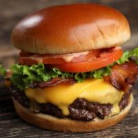 Bacon Cheeseburger ( Aka Vagabond Cheeseburger ) · ● Bacon Cheeseburger - 1/2 pound burger, lettuce, tomato, American cheese, bacon &
house sau...