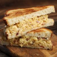 The Gold Standard · ● The Gold Standard - classic mac & cheese with diced bacon on white bread $9