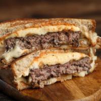 Patty Andrews · ● Patty Andrews — hamburger patty, pepper jack cheese, grilled onions, sauteed
mushrooms & S...