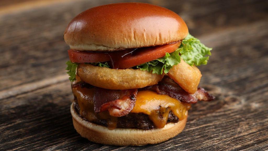 Butch’S Wild Bbq Burger · Butch’s Wild BBQ Burger - 1/2 pound burger*, BBQ sauce, cheddar cheese, bacon, onion rings, lettuce & tomato $13.50