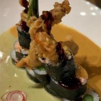 Curry Soft Shell Crab Roll · Crispy soft-shell crab, asparagus, crab meat, avocado, topped with green curry sauce