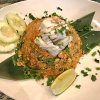 Crab Meat Fried Rice · Jumbo lump crab meat, fried egg, onions, chef's special sauce.