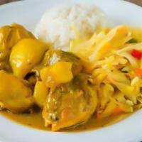 Curry Chicken · Served with Rice and Peas or White Rice with Steamed Veggies or Salad