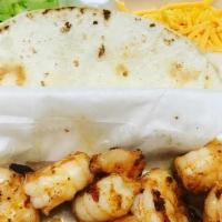 Shrimp Tacos · Build your own tacos with a 1/2 pound of shrimp fried or grilled, three flour shells, crisp ...