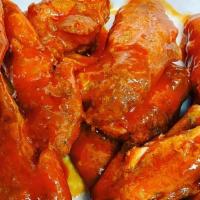Buffalo Wings (12 Pcs) · Hand-cut pieces tossed in a spicy buffalo sauce with fries, dinner roll, and choice of ranch...
