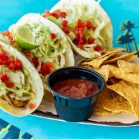 Fish Tacos · Flour tortillas with blackened catch of the day, pico de gallo, shredded cabbage, lime juice...