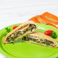 Spinach Pie With Feta · Spinach, onions, feta, extra virgin olive oil, flour, yeast and salt. Another delicious auth...
