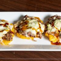 Tres Tostones Carne/3 Beef Tostones · Tomatoes, onions, mozzarella cheese and homemade sauce.