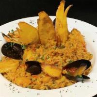 Arroz Con Mariscos · Seafood rice.