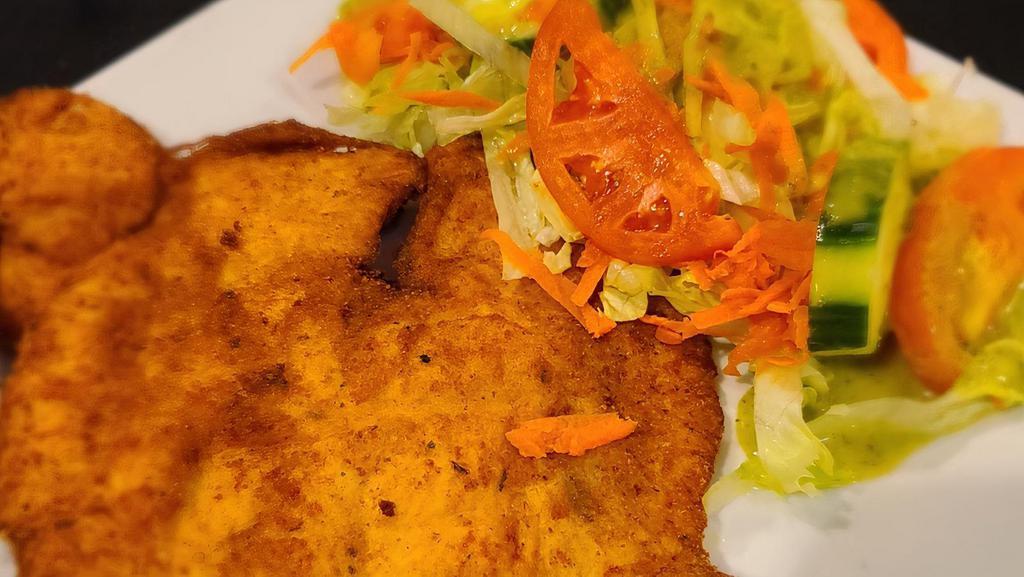 Milanesa De Pollo · Breaded chicken breast. Served with two sides.