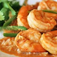 Camarones A La Plancha En Salsa De Ajo · Grilled shrimp in garlic sauce. Served with two sides.