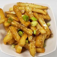 Roasted Sesame Sticky Fries · You won't stop eating these until it's all gone.