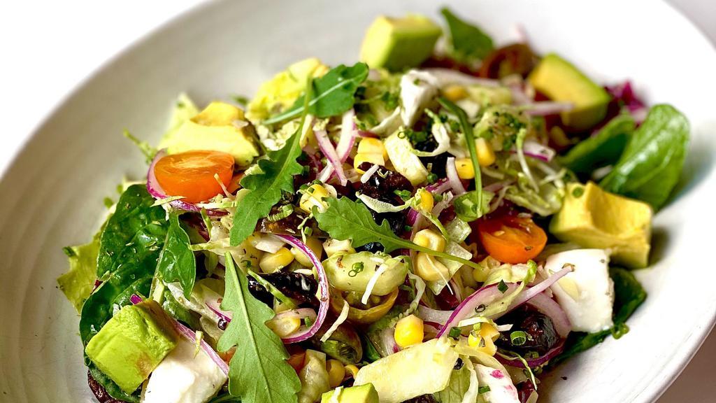 Chopped Vegetable Salad · Baby mix greens, corn, tomato, olives, avocado, beets, onions, cucumber, and oregano dressing.