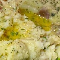 Rustic Mash Potato · Red potato mashed with heavy cream garlic butter and fresh herbs