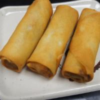 Vegetable Spring Rolls (3 Pcs) · Deep Fried Vegetable Spring Rolls with scallion & sesame seeds, drizzled with sweet aioli & ...