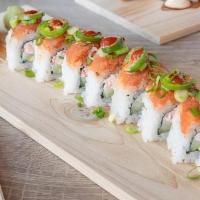 Spicy Tuna Cali Roll · Crabmeat, Cucumber, Avocado Roll with Spicy Tuna on Top, Jalapeno, Green Onion and Spicy Sauce