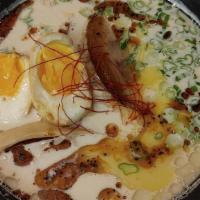 Tonkotsu Ramen · Pork broth with Chashu (Japanese pork belly), corns, scallion, bamboo shoots & boiled egg. S...