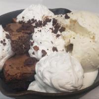 Brownie A La Mode · Fudgy chocolate brownie, vanilla ice cream, chocolate & carmel sauce. Topped with whipped cr...
