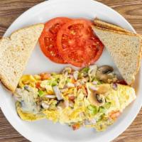 Veggie Omelette · includes mushrooms , onions, peppers and tomatoes