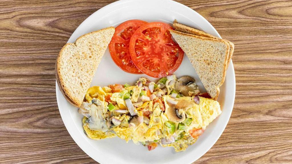 Veggie Omelette · includes mushrooms , onions, peppers and tomatoes
