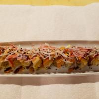 Mango Roll · Tempura shrimp, topped with fresh mango & crab stick, served with spicy mayonnaise, cream sa...