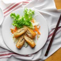 Spring Roll (2) · Thin, crispy rolls with pork, shrimp, carrots & cabbage.