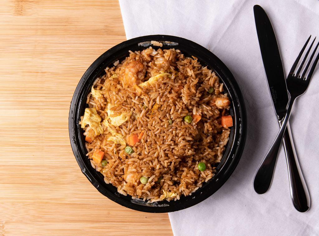 Fried Rice · Options of chicken, shrimp, beef, pork or vegetable, stir-fried in brown sauce with eggs, peas & carrot.