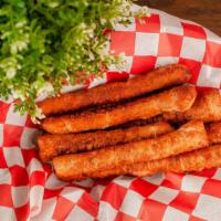 Cinnamon Sticks · Fresh made dough, buttered and sprinkled with cinnamon and sugar. served with cream cheese i...