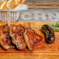 Picanha Steak · 12 oz picanha steak with sausage or blood sausage.