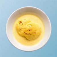 Rasmalai · Our house made village cheese fritters steeped in  rich condensed milk with crushed pistachi...