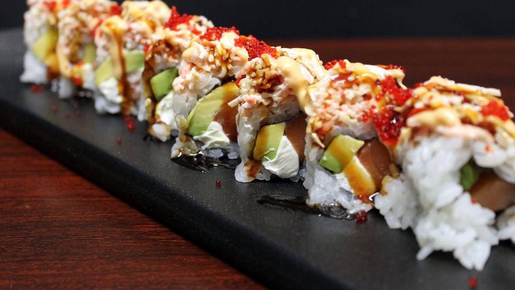 Fantasy Special Raw Roll · Smoked salmon, cream cheese, avocado topped with crab salad, spicy mayo, eel sauce, and fish egg.