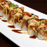 Atomic Bomb Special Raw Roll · Pressed spicy tuna, salmon, and yellowtail seared with spicy mayo, eel sauce hot sauce, and ...