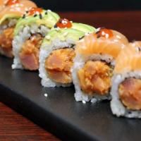 Pink Lady Special Raw Roll · Spicy tuna and tempura flake topped with salmon, avocado, ponzu sauce, and hot sauce.