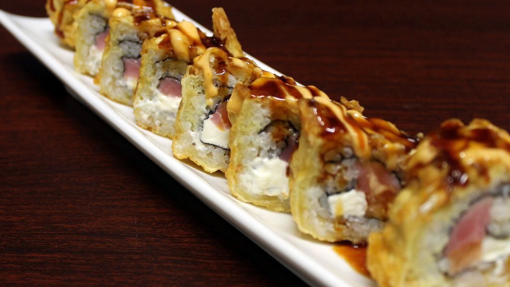 Yummy Special Fried Roll · Tuna, salmon, and cream cheese flash fried with spicy mayo, eel sauce, and ponzu.